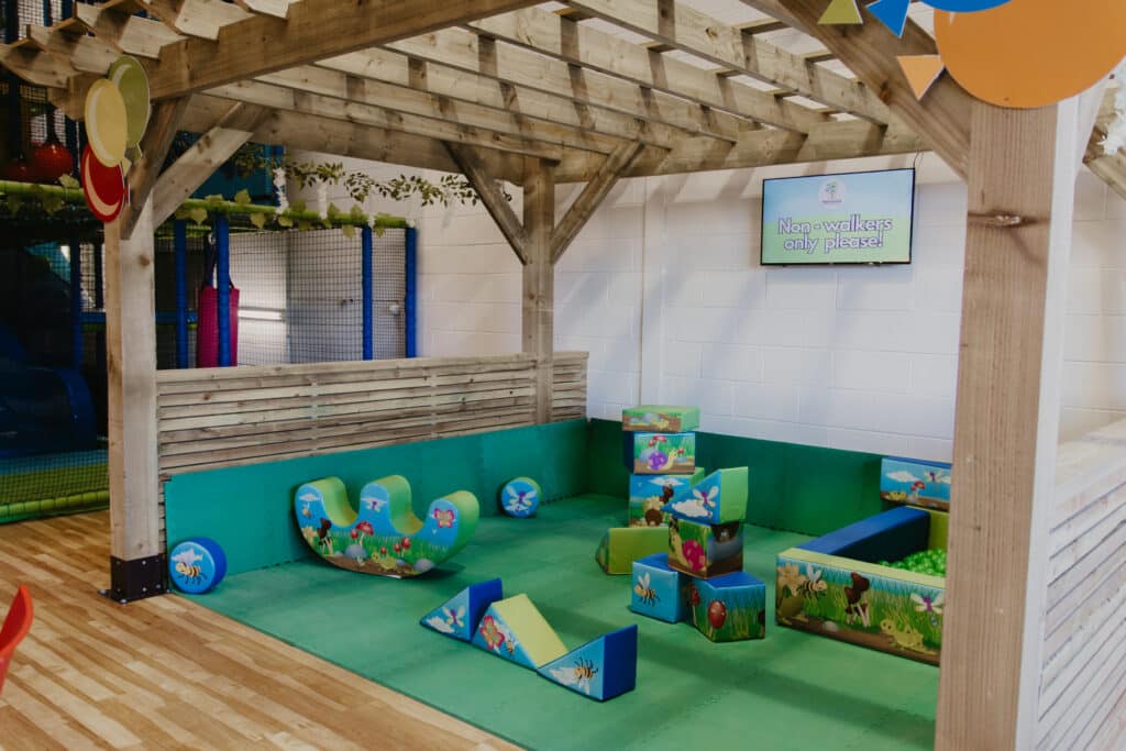 Toddler soft play area with non-walkers sign