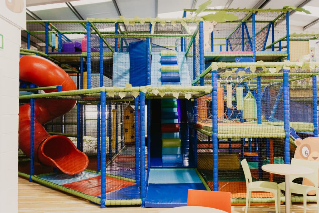 Tree House soft play frame with slides and toddler activities