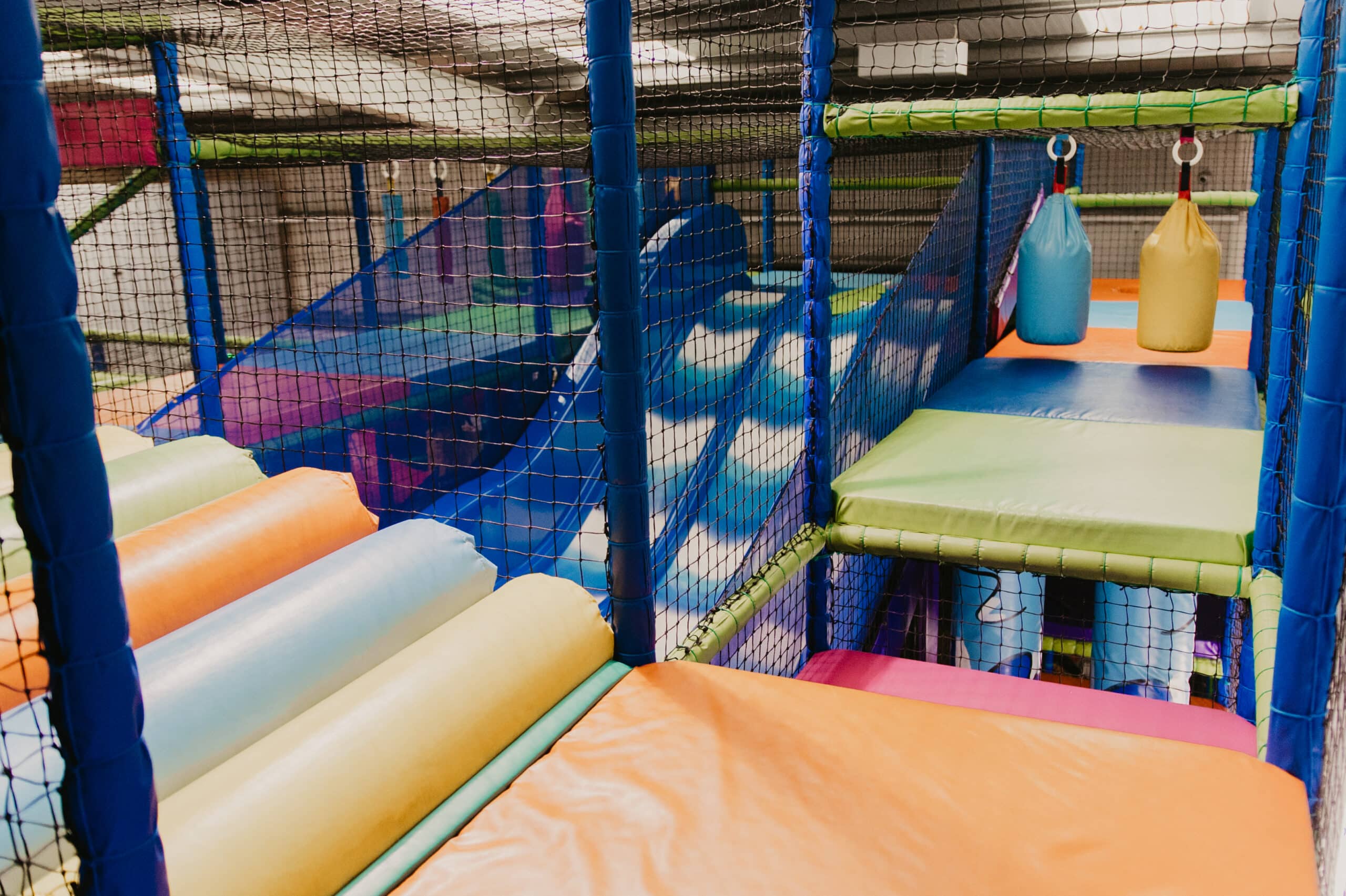 Indoor soft play slide and climbing area