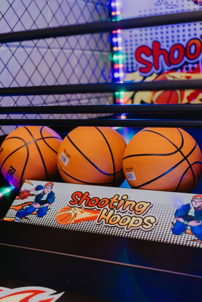 Shooting hoops basketball game at Tree House